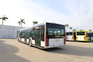 Back view of apron bus parked in a lot