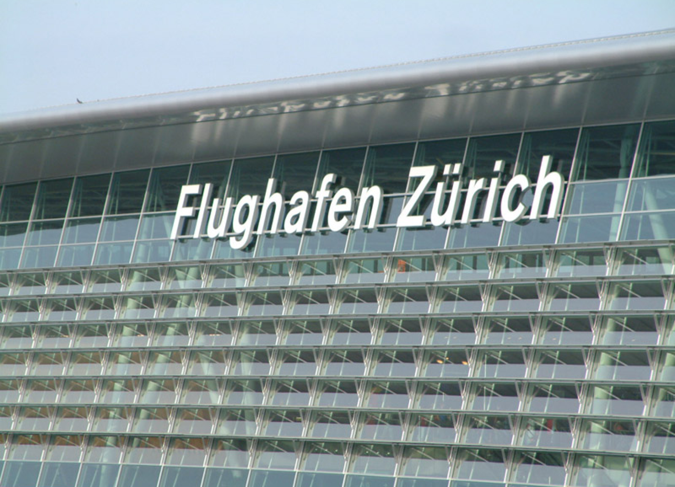 Zurich airport sign on roof, one of the eco-friendly airports